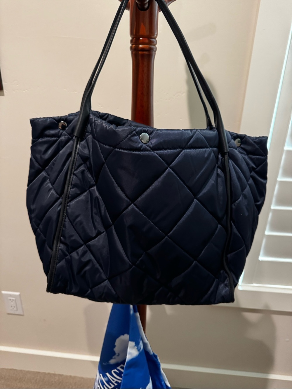 Quilted Navy Tote with Black Handles. MZWallace